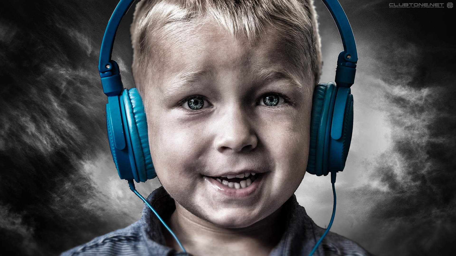 blue-eyed boy with blue headphones  