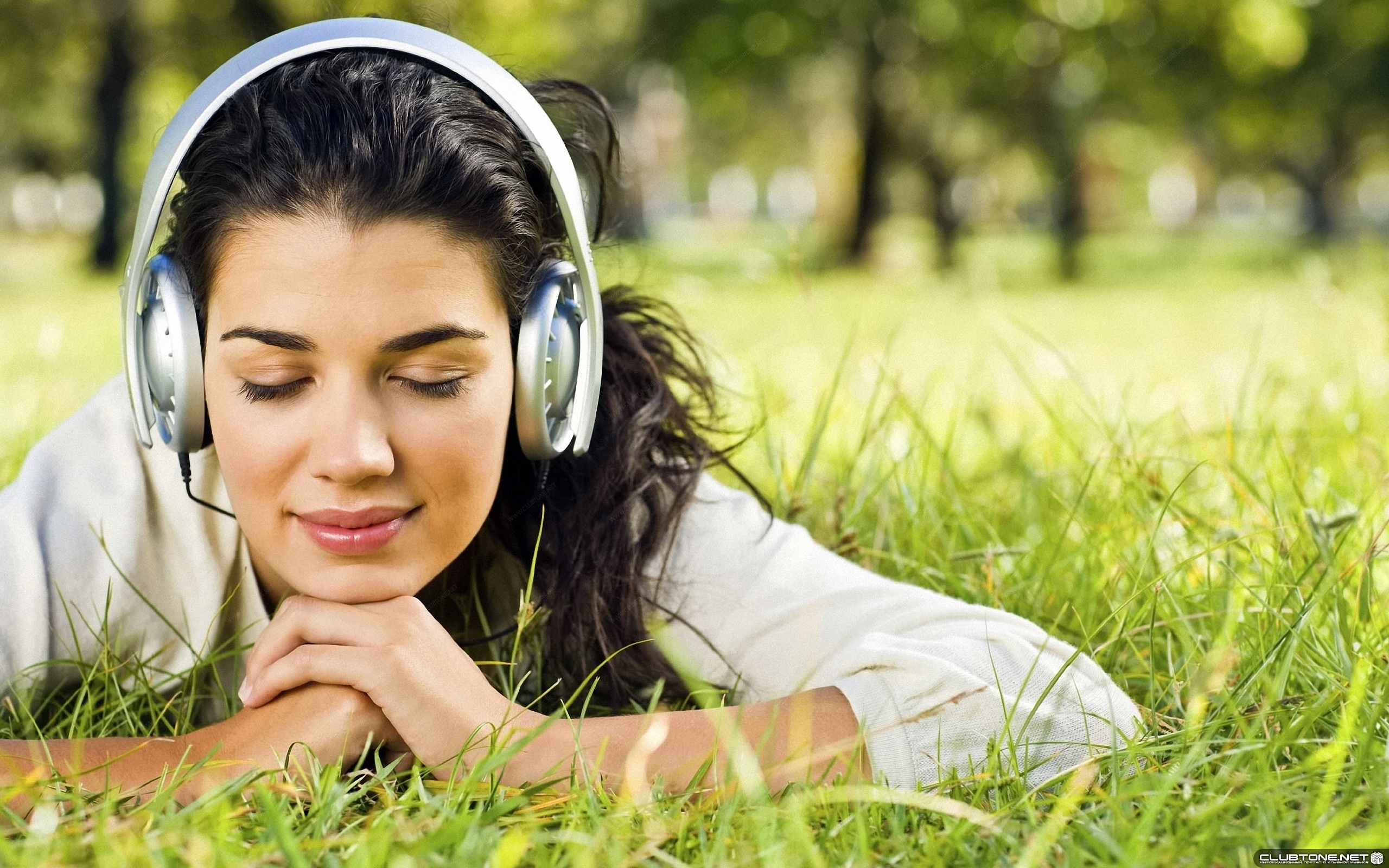 girl earmuff in the grass  